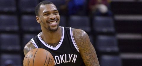 Brooklyn Nets guard Sean Kilpatrick (6) smiles as he allows the shot clock to expire in the final seconds of an NBA basketball game against the Memphis Grizzlies Monday, March 6, 2017, in Memphis, Tenn. The Nets won by a score of 122-109. (AP Photo/Brandon Dill)
