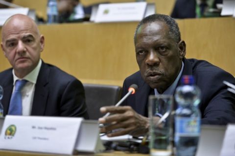 Issa Hayatou, right, speaks as FIFA President Gianni Infantino, left, listens, at the opening of the general assembly of the Confederation of African Football (CAF) in Addis Ababa, Ethiopia Thursday, March 16, 2017. Issa Hayatou was voted out as president of the African soccer confederation on Thursday after 29 years in charge, losing to challenger Ahmad of Madagascar in a major shakeup for the sport on the continent. (AP Photo)