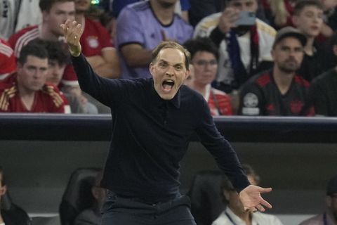 Bayern's head coach Thomas Tuchel shouts out as gives instructions from the side line during the Champions League semifinal first leg soccer match between Bayern Munich and Real Madrid at the Allianz Arena in Munich, Germany, Tuesday, April 30, 2024. (AP Photo/Matthias Schrader)