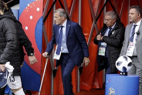 Uruguay head coach Oscar Tabarez, center, arrives for the group A match between Egypt and Uruguay at the 2018 soccer World Cup in the Yekaterinburg Arena in Yekaterinburg, Russia, Friday, June 15, 2018. (AP Photo/Mark Baker)