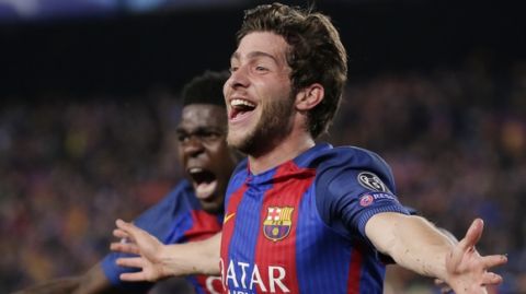 Barcelona's Sergi Roberto celebrates after scoring the sixth goal during the Champions League round of 16, second leg soccer match between FC Barcelona and Paris Saint Germain at the Camp Nou stadium in Barcelona, Spain, Wednesday March 8, 2017. Barcelona won 6-1. (AP Photo/Emilio Morenatti)