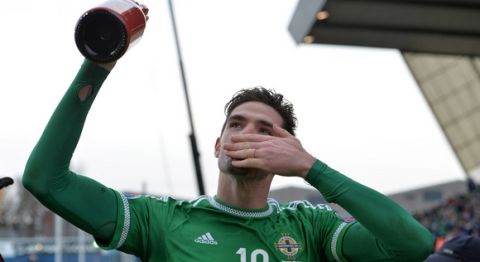 BELFAST, NORTHERN IRELAND - MARCH 29:  Kyle Lafferty of Northern Ireland blows a kiss to the home support after the EURO 2016 Group F qualifier at Windsor Park on March 29, 2015 in Belfast, Northern Ireland.  (Photo by Charles McQuillan/Getty Images)