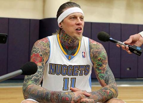 ORG XMIT: USPW-68510 Dec 15, 2011; Denver, CO, USA; Denver Nuggets center Chris Andersen (11) is interviewed by reporters during media day at the Pepsi Center. Mandatory Credit: Ron Chenoy-US PRESSWIRE ORIG FILE ID:  20111215_jla_ac4_021.jpg