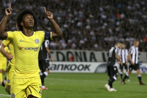 Chelsea's Willian celebrates after scoring his side's opening goal during a Group L Europa League soccer match between PAOK and Chelsea at Toumba stadium in the northern Greek port city of Thessaloniki, Thursday, Sept. 20, 2018. (AP Photo/Thanassis Stavrakis)
