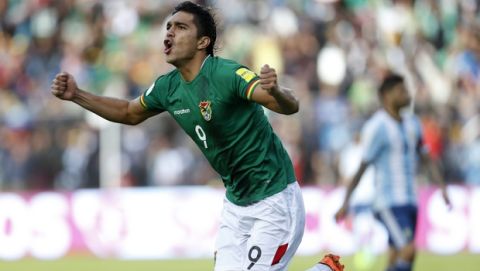 Bolivia's Marcelo Martins celebrates his goal against Argentina during a 2018 Russia World Cup qualifying soccer match at the Hernando Siles stadium in La Paz, Bolivia, Tuesday, March 28, 2017. (AP Photo/Juan Karita)