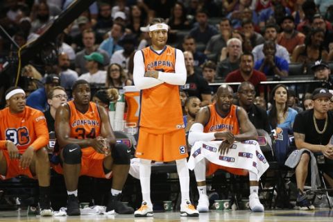 3's Company player/captain and coach Allen Iverson, center, watches from the sideline during the first half of Game 3 against the Ball Hogs in the BIG3 Basketball League debut, Sunday, June 25, 2017, at the Barclays Center in New York. (AP Photo/Kathy Willens)