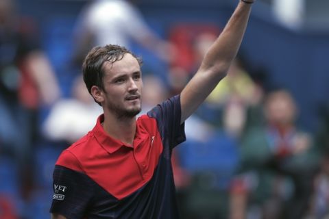 Daniil Medvedev of Russia gestures to spectators after defeating Fabio Fognini of Italy in the men's singles quarterfinals match at the Shanghai Masters tennis tournament at Qizhong Forest Sports City Tennis Center in Shanghai, China, Friday, Oct. 11, 2019. (AP Photo/Andy Wong)