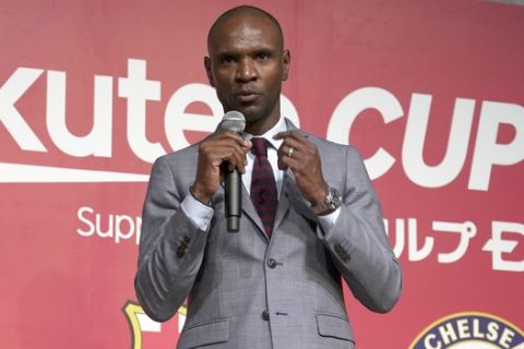 Eric Abidal, the technical secretary of FC Barcelona, delivers a speech during a press conference in Tokyo Thursday, April 18, 2019. FC Barcelona will play in two friendly soccer matches against Chelsea FC in Saitama on July 23 and against Japan's Vissel Kobe in Kobe on July 27. (AP Photo/Eugene Hoshiko)