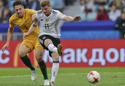 Germany's Timo Werner kicks the ball past Australia's Milos Degenek during the Confederations Cup, Group B soccer match between Australia and Germany, at the Fisht Stadium in Sochi, Russia, Monday, June 19, 2017. (AP Photo/Thanassis Stavrakis)