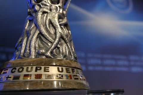 The Europa League trophy is shown during the draw for the Europa League 2009/10 third qualifying round at the UEFA headquarters in Nyon, Switzerland, Friday, July 17, 2009. (AP Photo/Keystone/Martial Trezzini)