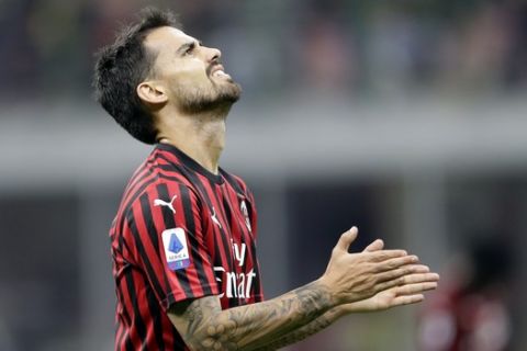 AC Milan's Suso gestures during a Serie A soccer match between AC Milan and Lecce, at the San Siro stadium in Milan, Italy, Sunday, Oct.20, 2019. (AP Photo/Luca Bruno)