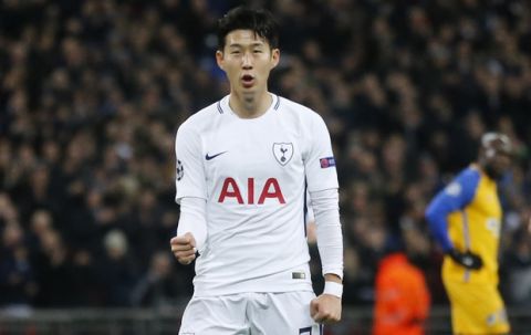 Tottenham's Son Heung-min, right, celebrates his goal against APOEL during the Champions League Group H soccer match between Tottenham and APOEL Nicosia in London, Wednesday, Dec. 6, 2017. (AP Photo/Frank Augstein)