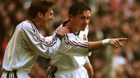 Real Madrid's Yugoslavian striker Predrag Mijatovic, right, celebrates with teammate Robert Jarni after scoring against crosstown rivals Atletico Madrid in Madrid Sunday Jan. 17, 1999. (AP Photo/Paul White)