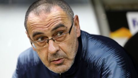 Chelsea's coach Maurizio Sarri attends the Uefa Europa League, first leg semifinal soccer match between Eintracht Frankfurt and FC Chelsea in the Commerzbank Arena in Frankfurt, Germany, Thursday, May 2, 2019. (AP Photo/Michael Probst)