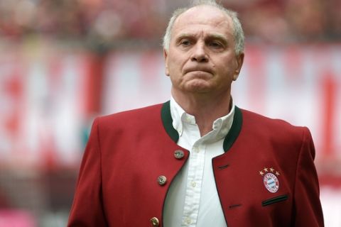 FILE - In this  May 14, 2016 file picture former Bayern Munich president Uli Hoeness  waits in the Munich stadium.  Bayern Munich says Uli Hoeness hopes to return as the club's president in November  taking back a job that he gave up in 2014 after being convicted of tax evasion. Bayern said Monday Aug. 8, 2016 that Hoeness will be a candidate for the job when club members elect the president at their annual general meeting.  (Angelika Warmuth/dpa  via AP,file)
