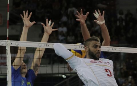 France's Earvin Ngapeth scores the last point against Slovenia's team during their Volleyball European Championship final match in Sofia, Bulgaria, Sunday ,  Oct. 18, 2015. (AP Photo/Valentina Petrova)
