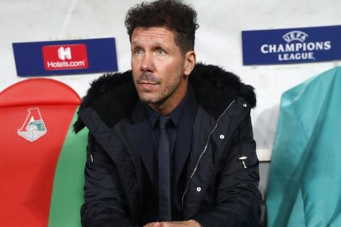 Atletico Madrid's head coach Diego Simeone looks out prior to the Champions League Group D soccer match between Lokomotiv Moscow and Atletico Madrid at the Lokomotiv Stadium in Moscow, Russia, Tuesday, Oct. 1, 2019. (AP Photo/Pavel Golovkin)