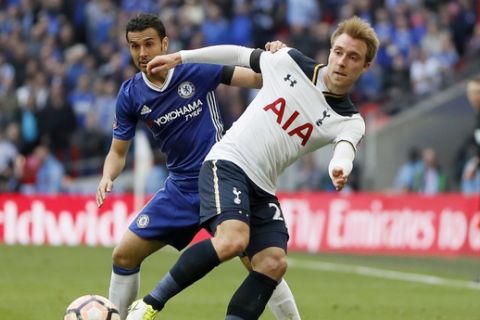 Chelsea's Pedro, left, competes for the ball with Tottenham Hotspur's Christian Eriksen during the English FA Cup semifinal soccer match between Chelsea and Tottenham Hotspur at Wembley stadium in London, Saturday, April 22, 2017. (AP Photo/Kirsty Wigglesworth)