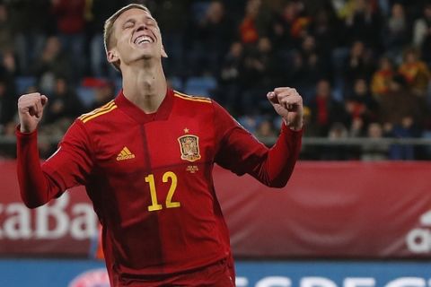 Spain's Dani Olmo celebrates after scoring his side's fifth goal during a Euro 2020 Group F qualifying soccer match between Spain and Malta at the Ramon de Carranza stadium in Cadiz, Spain, Friday Nov. 15, 2019. (AP Photo/Miguel Morenatti)