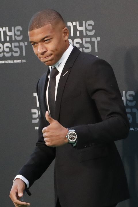 French soccer player Kylian Mbappe arrives for the ceremony of the Best FIFA Football Awards in the Royal Festival Hall in London, Britain, Monday, Sept. 24, 2018. (AP Photo/Frank Augstein)
