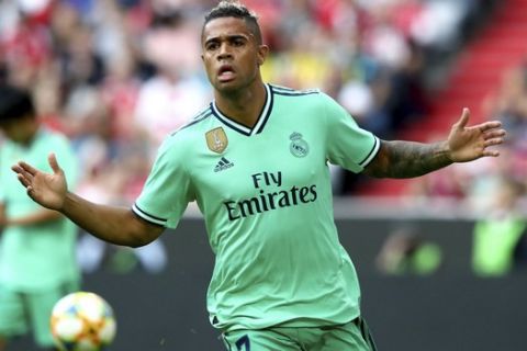 Real Madrid's Mariano Diaz celebrates after scoring his side's fifth goal during a friendly soccer Audi Cup match between Real Madrid and Fenerbahce Istanbul at the Allianz Arena stadium in Munich, Germany, Wednesday, July 31, 2019. (AP Photo/Matthias Schrader)