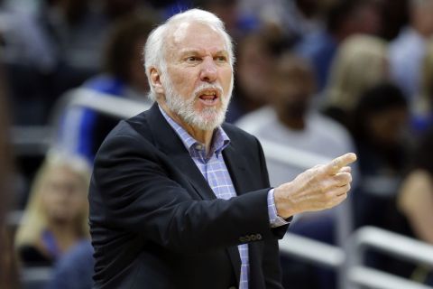 San Antonio Spurs head coach Gregg Popovich directs his players against the Orlando Magic during the second half of an NBA basketball game, Friday, Oct. 27, 2017, in Orlando, Fla. Orlando won 114-87. (AP Photo/John Raoux)
