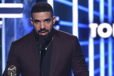 Drake accepts the the award for top male artist at the Billboard Music Awards on Wednesday, May 1, 2019, at the MGM Grand Garden Arena in Las Vegas. (Photo by Chris Pizzello/Invision/AP)