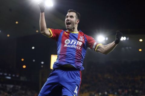 Crystal Palace's Luka Milivojevic celebrates scoring his team's second goal against Wolverhampton during a Premier League soccer match at Molineux, Wednesday, Jan. 2, 2019, in Wolverhampton, England. (David Davies/PA via AP)