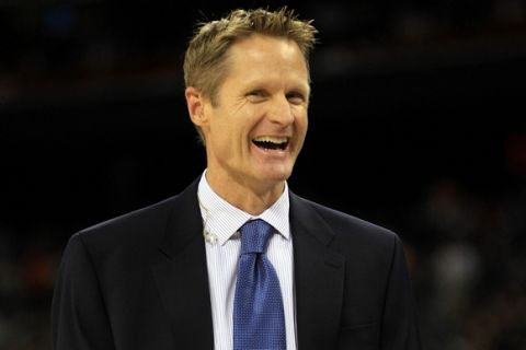 HOUSTON, TX - APRIL 04:  Broadcaster Steve Kerr smiles on the court before the National Championship Game of the 2011 NCAA Division I Men's Basketball Tournament between the Butler Bulldogs and Connecticut Huskies at Reliant Stadium on April 4, 2011 in Houston, Texas.  (Photo by Streeter Lecka/Getty Images)