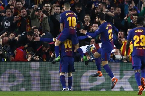 Barcelona's Lionel Messi, left, celebrates after scoring his side's third goal during the Champions League round of sixteen second leg soccer match between FC Barcelona and Chelsea at the Camp Nou stadium in Barcelona, Spain, Wednesday, March 14, 2018. (AP Photo/Manu Fernandez)