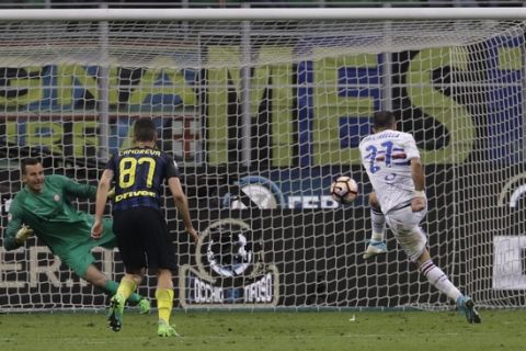 Sampdoria's Fabio Quagliarella scores on a penalty during a Serie A soccer match between Inter Milan and Sampdoria, at the San Siro stadium in Milan, Italy, Monday, April 3, 2017. (AP Photo/Antonio Calanni)