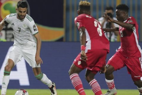 Algeria's Riyad Mahrez in action during the African Cup of Nations group C soccer match between Algeria and Kenya at 30 June Stadium in Cairo, Egypt, Sunday, June 23, 2019. (AP Photo/Hassan Ammar)