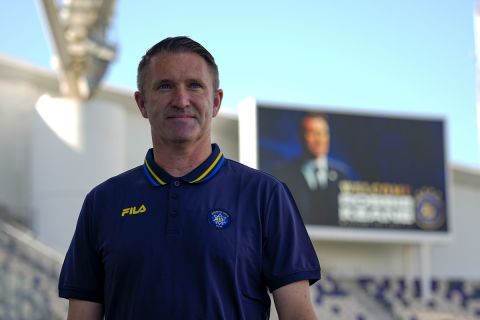 Former Ireland soccer great Robbie Keane poses for photographers as Maccabi Tel Aviv's head coach in Tel Aviv, Israel, Tuesday, June 27, 2023. Keane has been hired to coach Israeli club Maccabi Tel Aviv. It will be his first job leading a team that plays in European soccer competitions. The club says Keane signed a two-year contract. (AP Photo/Ariel Schalit)