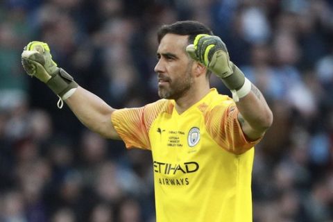 Manchester City's goalkeeper Claudio Bravo reacts after his team scored it's second goal during the League Cup soccer match final between Aston Villa and Manchester City, at Wembley stadium, in London, England, Sunday, March 1, 2020. (AP Photo/Ian Walton)