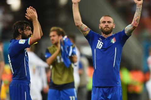 Daniele De Rossi of Italy (right) and Andrea Pirlo (left) celebrate Italy's victory over England in the 2014 FIFA World Cup Brazil Group D match between England and Italy at Arena Amazonia in Manaus, Brazil.  (Christopher Lee/Getty Images)