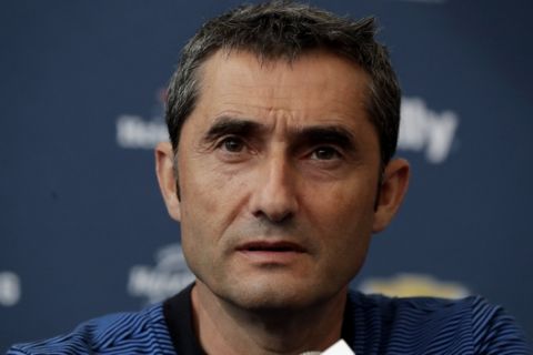 Barcelona head coach talks to reporters during a press conference a day before an International Champions Cup soccer match against Juventus, Friday, July 21, 2017, at Red Bull Arena in Harrison, N.J. (AP Photo/Julio Cortez)