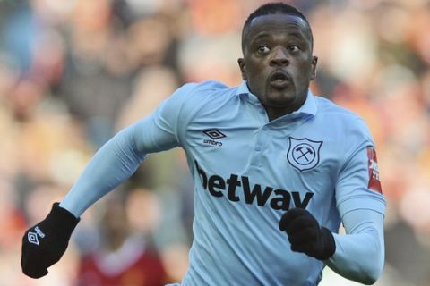 West Ham's Patrice Evra during the English Premier League soccer match between Liverpool and West Ham United at Anfield in Liverpool, England, Saturday, Feb. 24, 2018. (AP Photo/Rui Vieira)