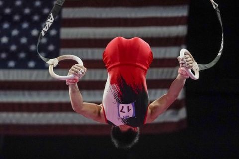 Daiki Hashimoto of Japan performs on the rings during the American Cup gymnastics competition Saturday, March 7, 2020, in Milwaukee. (AP Photo/Morry Gash)