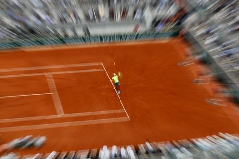 Spain's Rafael Nadal serves the ball Austria's Dominic Thiem during the men's final match of the French Open tennis tournament at the Roland Garros stadium in Paris, Sunday, June 9, 2019. Nadal won 6-3, 5-7, 6-1, 6-1. (AP Photo/Pavel Golovkin)