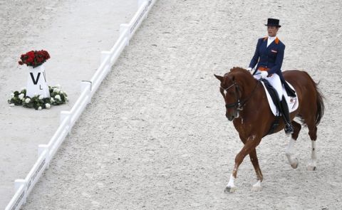 epa04374144 Dutch rider Adelinde Cornelissen on horse Jerich Parzival N.O.P.  competes in the Grand Prix Freestyle Dressage competition during the World Equestrian Games 2014 in Caen, France, 29 August 2014.  EPA/IAN LANGSDON
