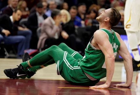 Boston Celtics' Gordon Hayward grimaces in pain in the first half of an NBA basketball game against the Cleveland Cavaliers, Tuesday, Oct. 17, 2017, in Cleveland. Hayward broke his left ankle on a play. (AP Photo/Tony Dejak)