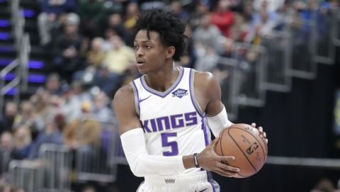 Sacramento Kings guard De'Aaron Fox (5) during the first half of an NBA basketball game against the Indiana Pacers in Indianapolis, Saturday, Dec. 8, 2018. (AP Photo/Michael Conroy)