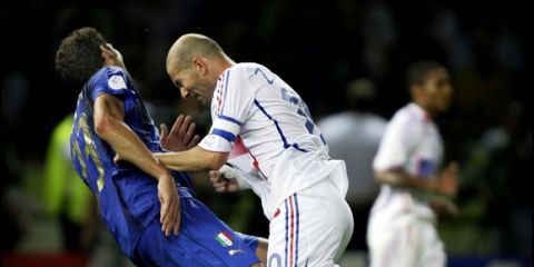 Amsterdam, NETHERLANDS: A picture taken 09 July 2006 shows France's captain Zinedine Zidane (R) headbutting Italy's defender Marco Materazzi 09 July 2006 during the football World Cup final in Berlin. The picture taken by Peter Schols of the Reuters news agency won 09 February 2007 the first prize in the Sports Action Stories category of the World Press Photo of the Year 2006 in Amsterdam. AFP PHOTO / Dagblad De Limburger/ GPD /Reuters / PETER SCHOLS *** IMPORTANT NOTICE *** This material is for single publications in print or for a temporary online publication, and may be used exclusively to publicize the 2007 World Press Photo contest and exhibition. It may not be published as part of an article or any other item that contains no direct link to World Press Photo and its activities. Nor may it be sold. The pictures may not be cropped or manipulated in any way. World Press Photo cannot authorize any other publication of the material. All other requests need to be addressed to the individual photographers and their official representatives. World Press Photo will be happy to provide you with any relevant information upon request. Publication must always be accompanied by the appropriate credit: NAME PHOTOGRAPHER, AGENCY / ORIGINAL PUBLICATION After publication the files must be deleted from your archive. Please send us a copy of the published article or let us know when you have published your article online for our press archive. (Photo credit should read Peter Schols/AFP/Getty Images)