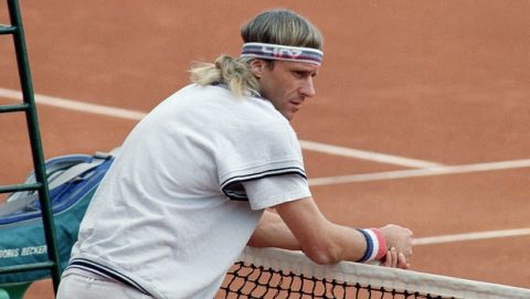 Bjorn Borg leans on the net at the Monte Carlo Tennis Open in Monaco on April 18, 1991. (AP Photo)