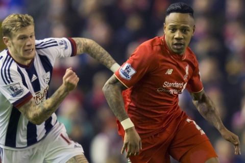 Liverpool's Nathaniel Clyne, right, fights for the ball against  West Bromwich Albion's James McClean during the English Premier League soccer match between Liverpool and West Bromwich Albion at Anfield Stadium, Liverpool, England, Sunday, Dec. 13, 2015. (AP Photo/Jon Super)
