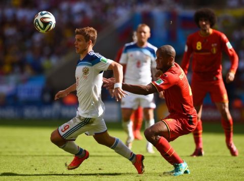 RIO DE JANEIRO, BRAZIL - JUNE 22: Alexander Kokorin of Russia controls the ball against Vincent Kompany of Belgium during the 2014 FIFA World Cup Brazil Group H match between Belgium and Russia at Maracana on June 22, 2014 in Rio de Janeiro, Brazil.  (Photo by Matthias Hangst/Getty Images)