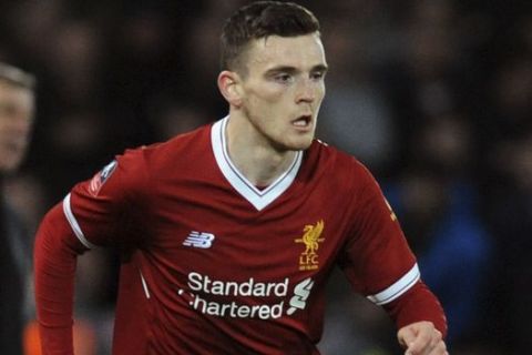 Liverpool's Andrew Robertson during the English FA Cup Third Round soccer match between Liverpool and Everton at Anfield in Liverpool, England, Friday, Jan. 5, 2018. (AP Photo/Rui Vieira)
