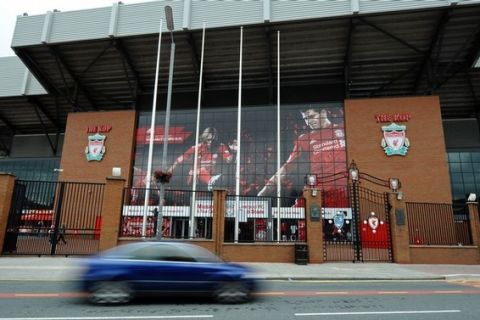 (FILES) A file photo taken on August 2, 2010, shows Liverpool Football Club's Anfield Stadium in Liverpool, England.  The board of directors at Liverpool has accepted an offer by New England Sports Ventures, owners of the Boston Red Sox baseball team, to buy the English football club, a statement said Wednesday, October 6, 2010.   Chairman Martin Broughton hit out at Liverpool's current American owners, Tom Hicks and George Gillett, for trying to block the sale and said he hoped the deal would allow the team to focus on building the team.   AFP PHOTO/PAUL  ELLIS/FILES (Photo credit should read PAUL ELLIS/AFP/Getty Images)