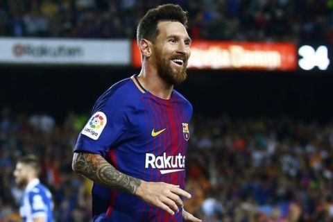FC Barcelona's Lionel Messi celebrates after scoring during the Spanish La Liga soccer match between FC Barcelona and Espanyol at the Camp Nou stadium in Barcelona, Spain, Saturday, Sept. 9, 2017. (AP Photo/Manu Fernandez)