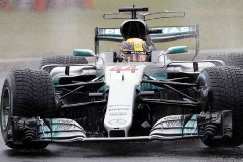Mercedes driver Lewis Hamilton of Britain steers his car during the qualifying session for Sunday's Italian Formula One Grand Prix, at the Monza racetrack, Italy, Saturday, Sept. 2, 2017. (AP Photo/Antonio Calanni)